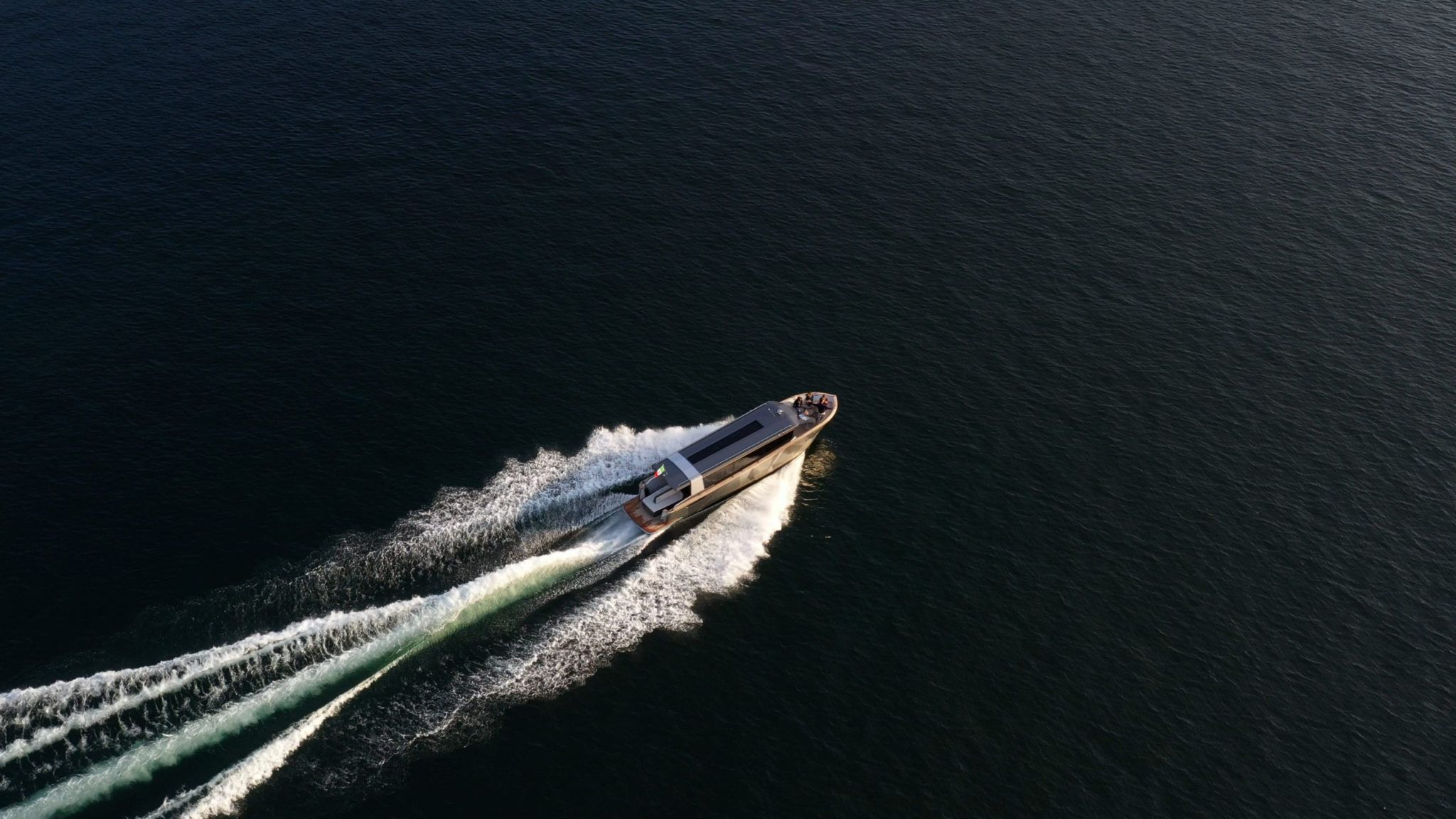 This limo tender belongs to lake como best boat rental - the guests enjoy a boat party during a lake como cruise and they are having forward cocktail with aperitiv